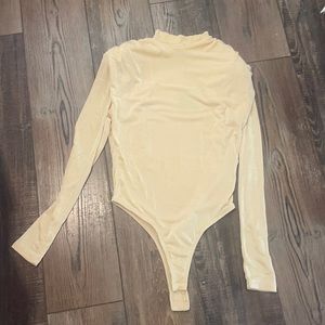 Brand new bodysuit